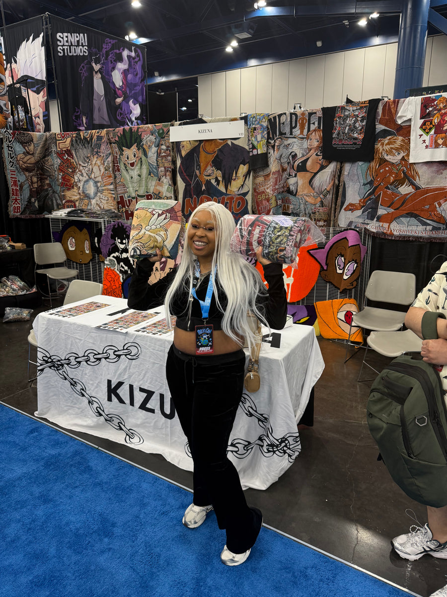 KIZUNA fans and pieces at an anime convention